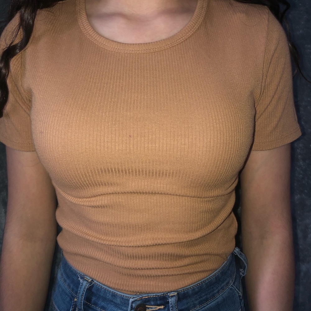 tan body suit